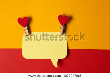 clothes pegs with hearts, a note, free place                             