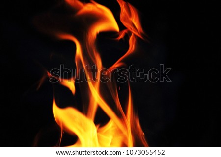 Blurred illustration of burning fire flame. blaze fire flame texture on black background
