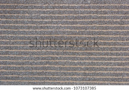 wallpaper texture background in light sepia toned art paper or wallpaper.