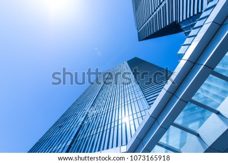  Blue building glass curtain wall  Royalty-Free Stock Photo #1073165918