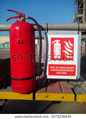 Inscription in English and Azeri: fire extinguisher