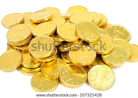 Gold coins of one euro,  on a white background