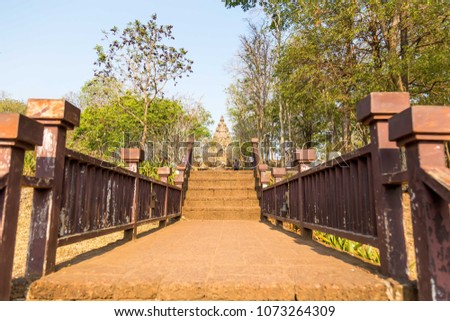Volcanic walkway with wooden railing behind Phanom Rung Historical Park or Prasat Hin Phanom Rung, landmark of Buriram province ,Thailand.
