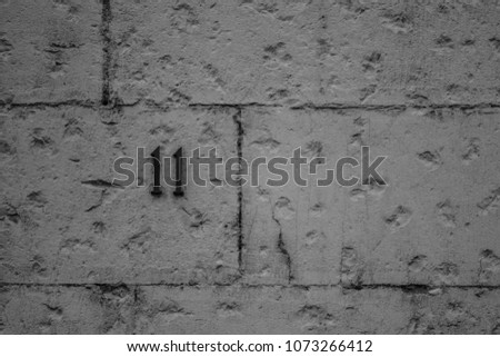 Stone wall from old house black and white
