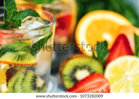 Homemade lemonade with fruit and mint