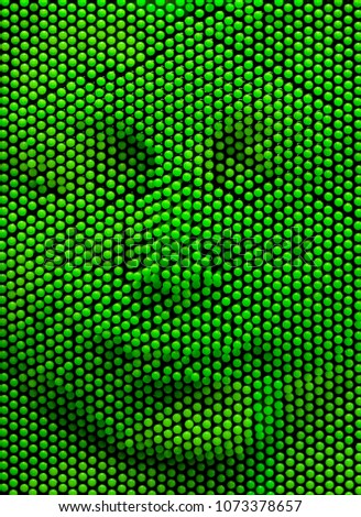 the human face print on toy green plastic sticks stamped, funny abstract portrait
