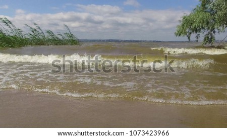 River Volga storm wave strong wind. Nature landscape water
