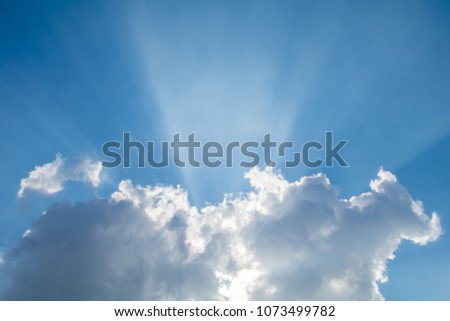 sunny shines through the clouds (Cumulonimbus) blue sky background