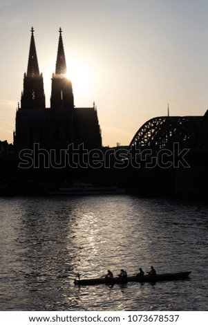 Cologne Dom and bridge silhuettes .Sun set people silhouettes .