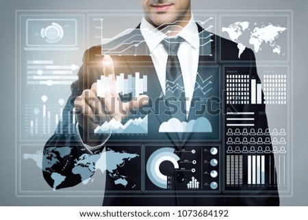 Abstract Image of Business man pointing touching the data digital hologram. Future, innovation, business, technology, internet and virtual reality concept.