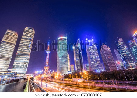 busy traffic with modern building in shanghai china