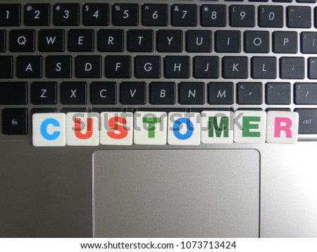Word Customer on keyboard background