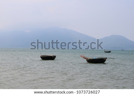 sea, mountain and boat 