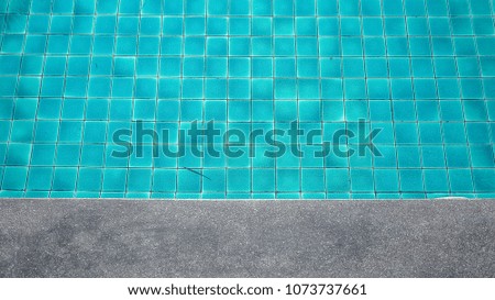 Minimal lifestyle. The swimming pool decorating with pattern of random blue glittering mosaic tile. Meaning of relax, freedom and comfortable.