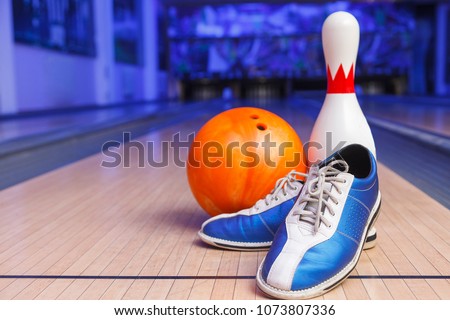 shoes, bowling pin and ball for bowling game, Copy Space 