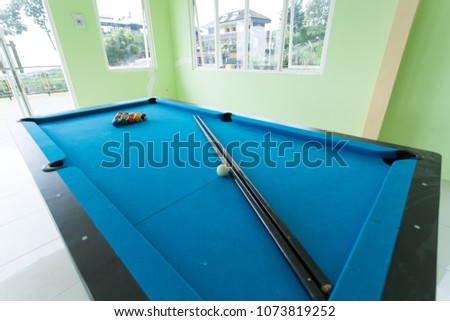 Room interior of luxury house with a billiard table	
