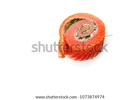 Salmon rolls with goat's cheese and dill isolated on white, top view.Healthy food or diet consept