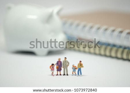 Miniature people, Happy family and children standding on white background with white pig bowl. Picture use for keep money for the future concept and business bank.