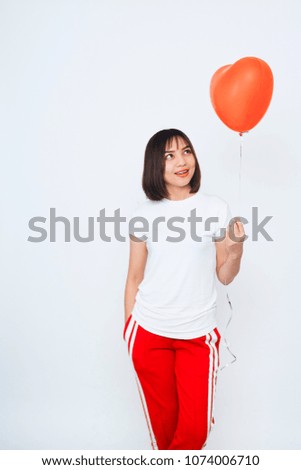 Portrait of good looking asian woman over gray background Concept Women's health care 