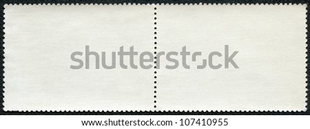 Blank postage stamp block on a black background