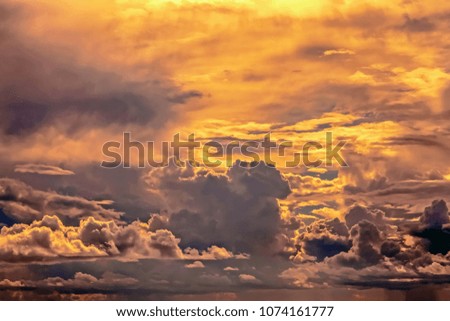 
Beautiful clouds with an orange evening sunset.