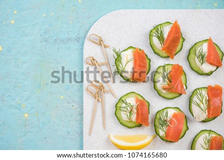 Smoked salmon, cottage cheese and cucumber snack for garden party.