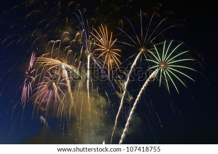 Colorful fireworks on sky background