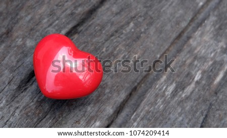 Red heart on wooden 