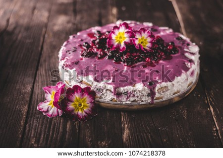 Cheesecake with white chocolate, berries sauce on top