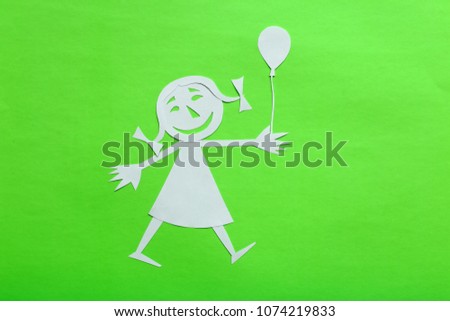 background of colored cardboard. the girl is made of white paper. in the style of a funny cartoon.