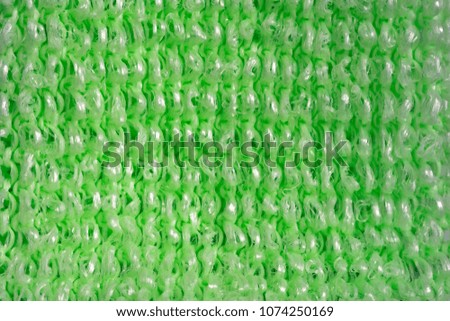texture of bright green yarn, pattern closeup