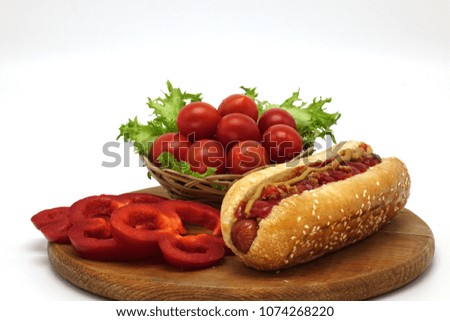 Hot dogs and French fries on white background.