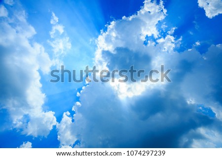 Sunbeam Shine through the cloud on the blue sky