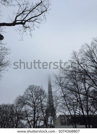 Eiffel Tower on a foggy morning