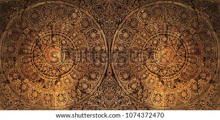 Details of a Natural Wooden Carving Art with Abstract Seamless Floral Pattern and Circle art and craft.