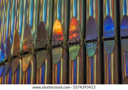 Organ pipes, gold color with reflecting light