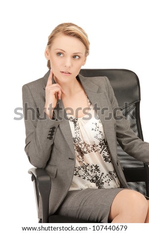 bright studio picture of beautiful pensive woman