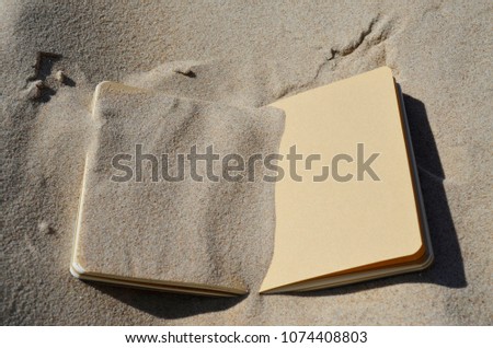 Open notebook in the desert