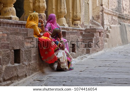 Colors of India. Women wearing sari in the fort of Jodhpur,Rajashtan Royalty-Free Stock Photo #1074416054