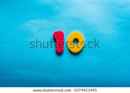 10 years old celebrating classic logo. Colored happy anniversary ten red yellow number. Greetings celebrates card. Traditional digits of ages. Sale, special prize, % off concept.