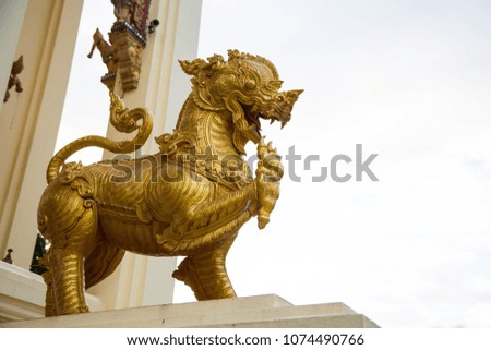 Himmapan gold lion at temple. Vientiane, Lao