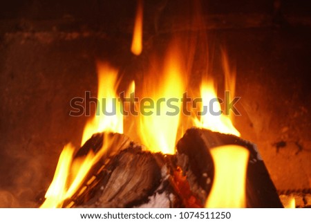 fire in a fireplace blurred background