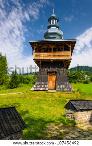 Tower of old orthodox church in Beskid Niski Mountains in summer time, Poland