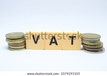 Finance Concept with Stack of Coins - VAT (Value Added Tax ) written on.