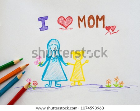 Mother's day concept. Greeting card Happy Mothers Day drawn by pencils on the paper