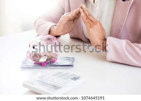 business man counting money at the table, accounting concept
