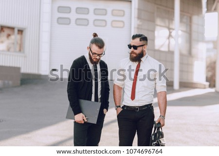 business man checking objects in glasses shirt