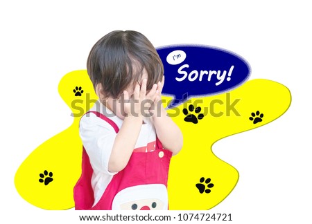Closeup cute asian kid put his hand in front of him with I'm sorry word in text box isolated on white background