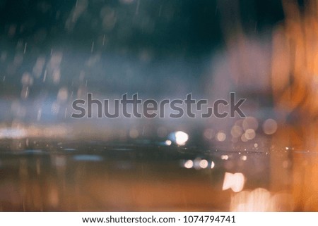 Night background of rain with bokeh. 