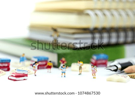 Miniature people : children and student with book and school background. Back to school,Education concept.